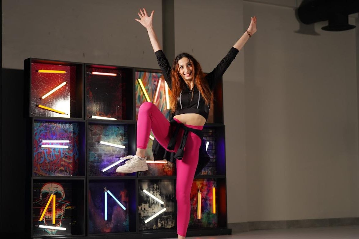 Trainer jumping with joy at LoCa Studios