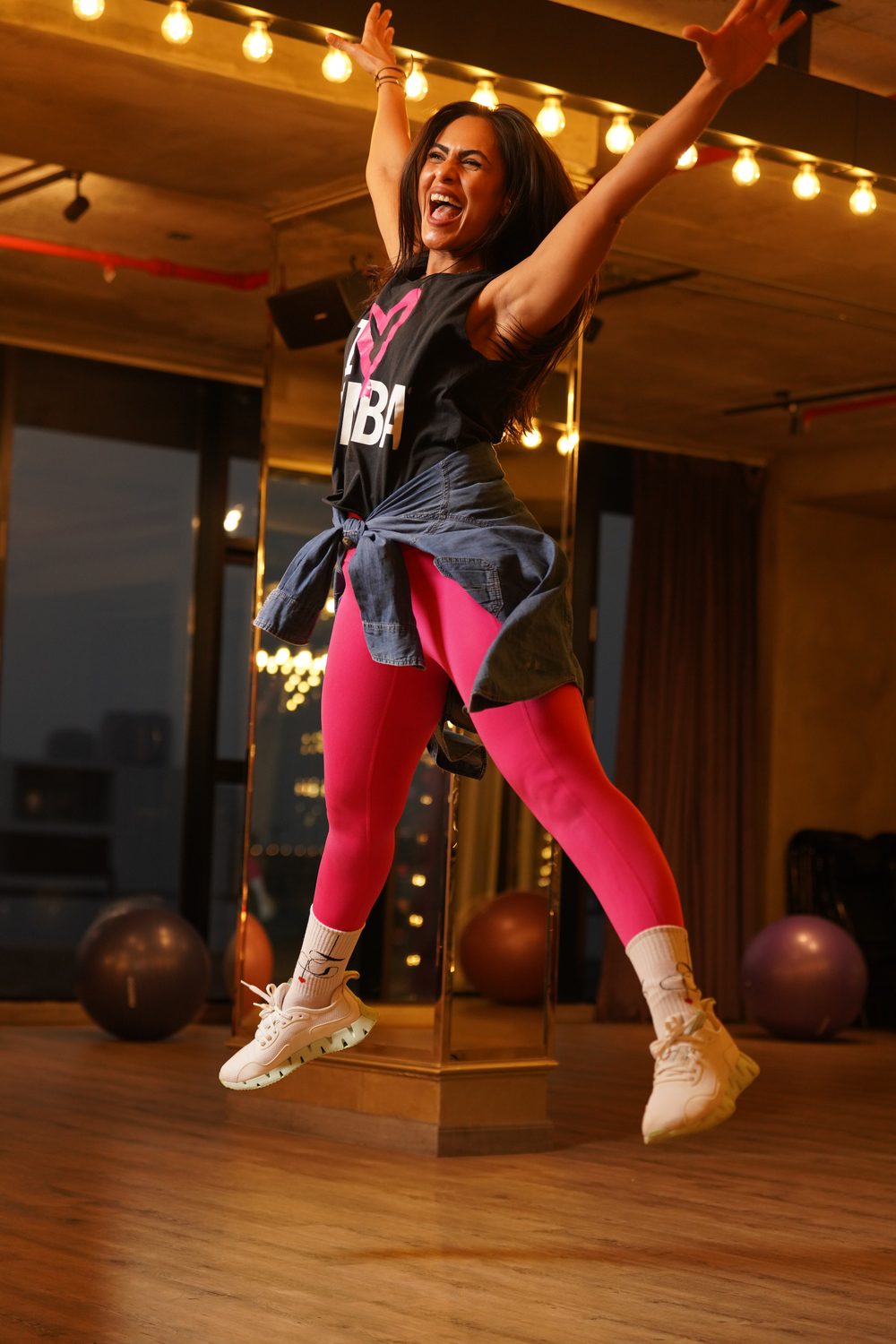 Trainer jumping with joy at LoCa Studios